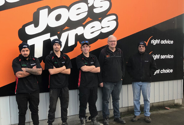 Joe's Tyres staff outside the workshop